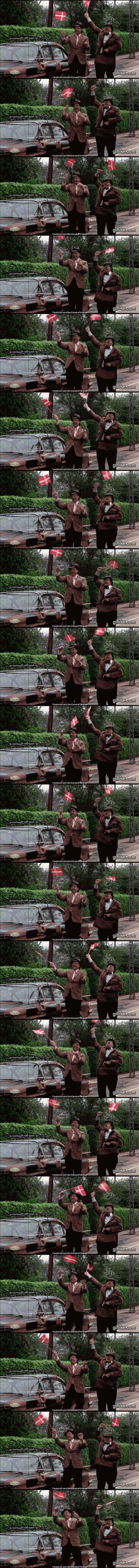 A GIF from the movie Olsen Banden, two men waving with flags in celebration